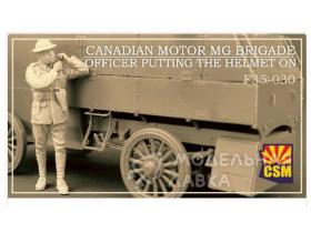 Canadian Motor MG Brigade Officer putting the helmet o